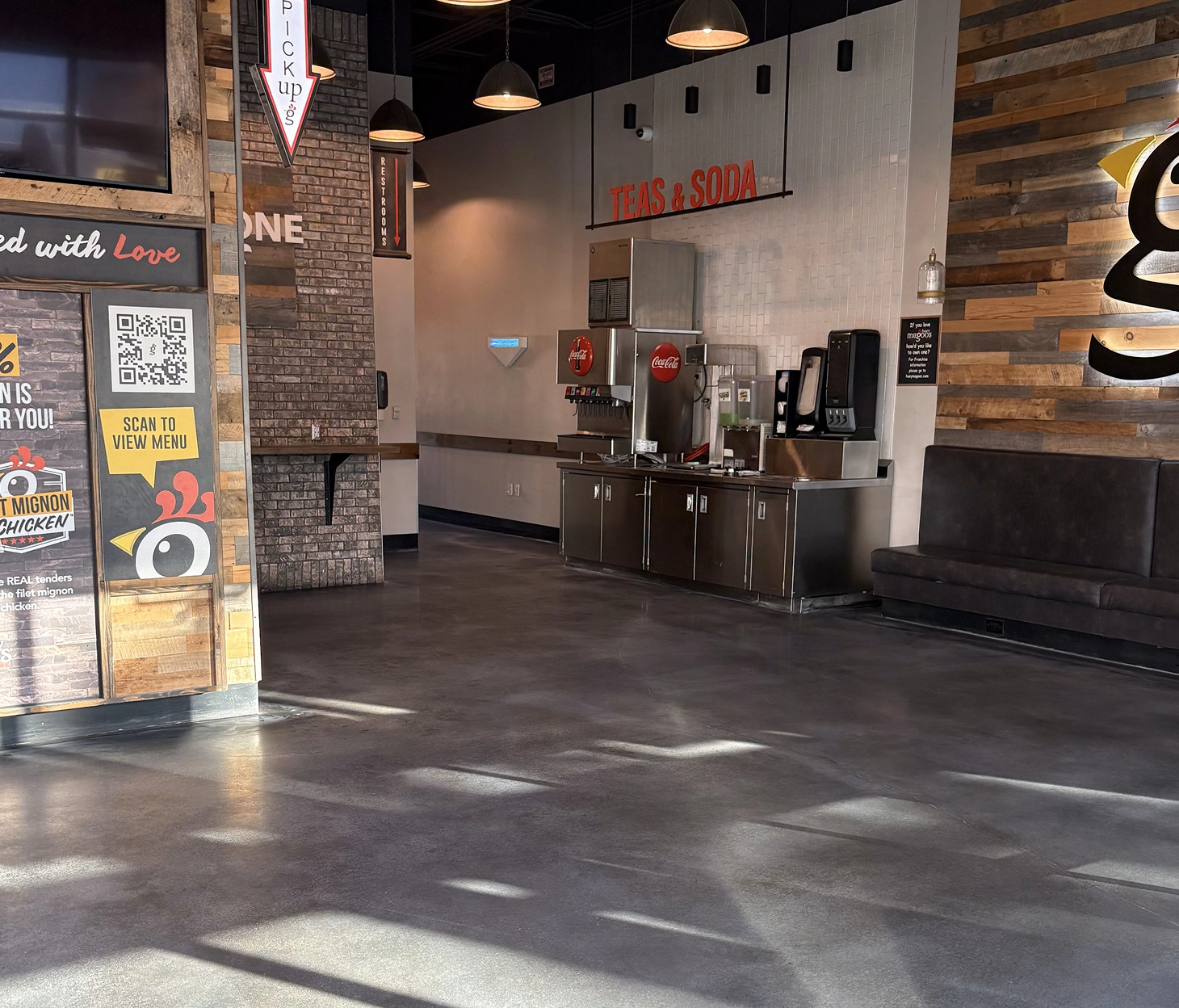 Soda fountain area with dark polished concrete
